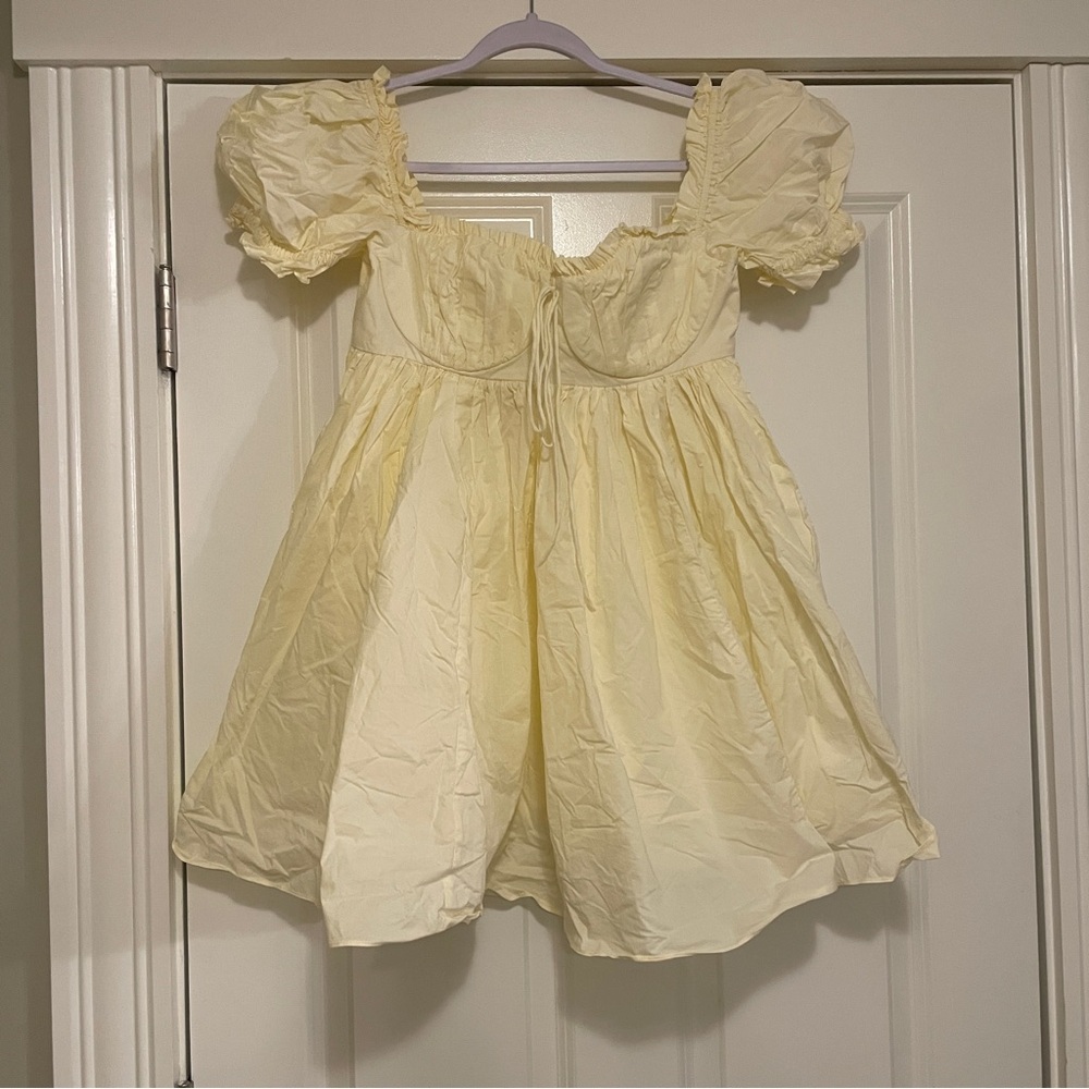 Selkie mini Bebe seashell Puff Sleeve Dress